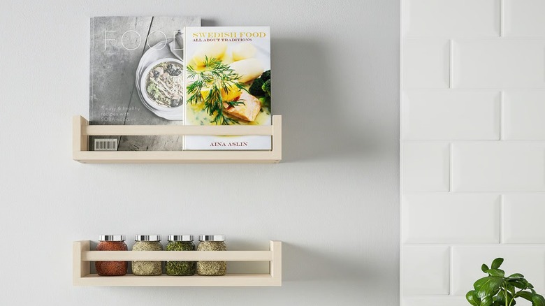 BEKVÄM Spice rack on wall with cookbooks and spice jars