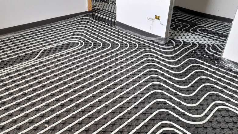 Pipes installed for a radiant floor heating system