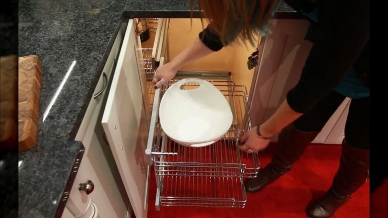 corner cabinet with built-in shelfs and warm lighting
