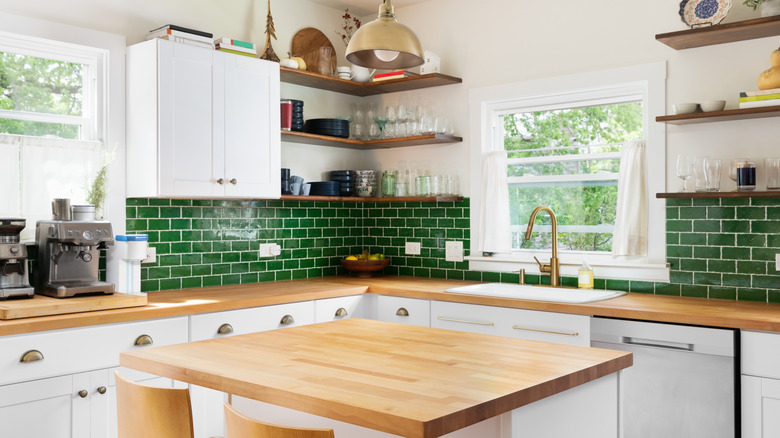 A kitchen with butcher block countertops