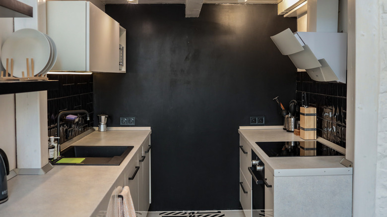 A kitchen with matte black finishes