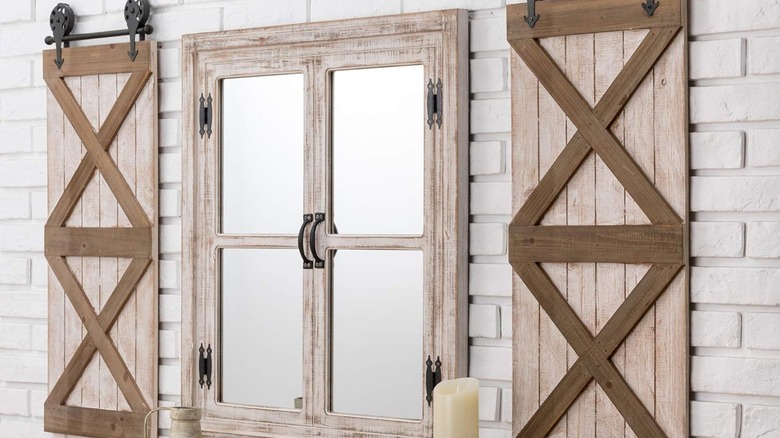 Barn door style shutters around a window