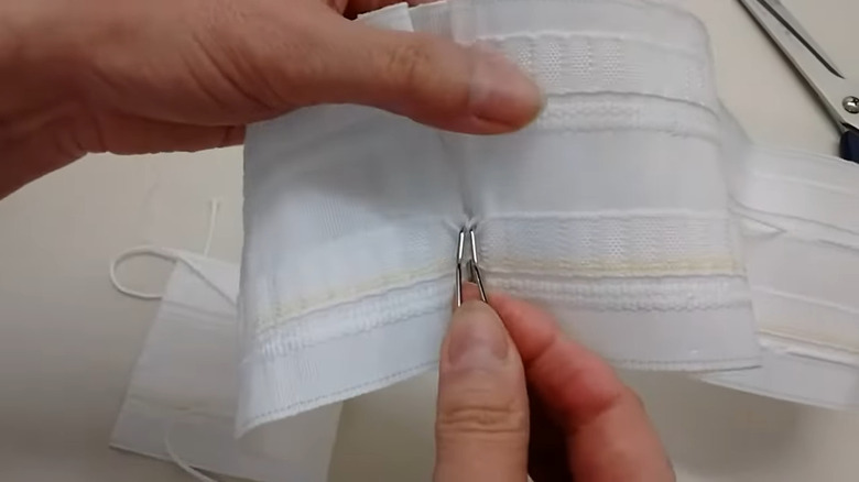 the back of a curtain with pleat tape