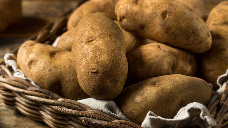 Idaho russet potatoes in basket 