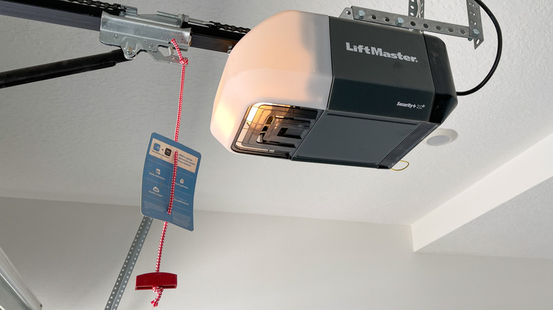 A Liftmaster garage door opener installed in a garage