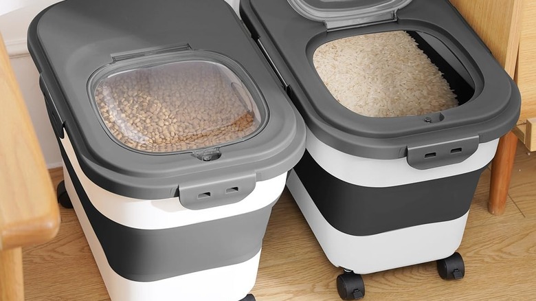 Two collapsible rolling food storage bins