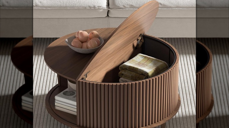 A round lift-up storage coffee table