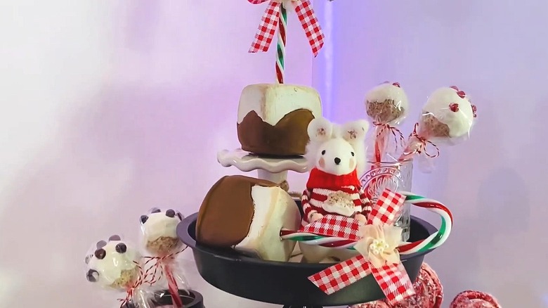 Artificial holiday treats with candy cane handles