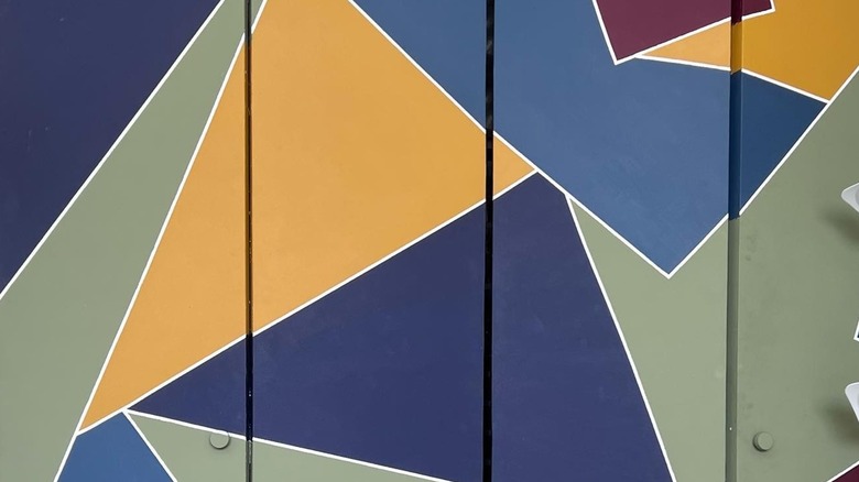 Painted abstract shapes on bifold closet doors
