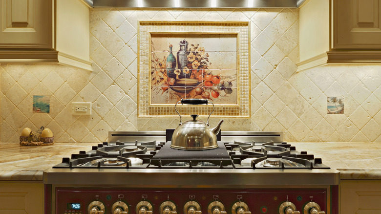 tuscan kitchen with tiled mural