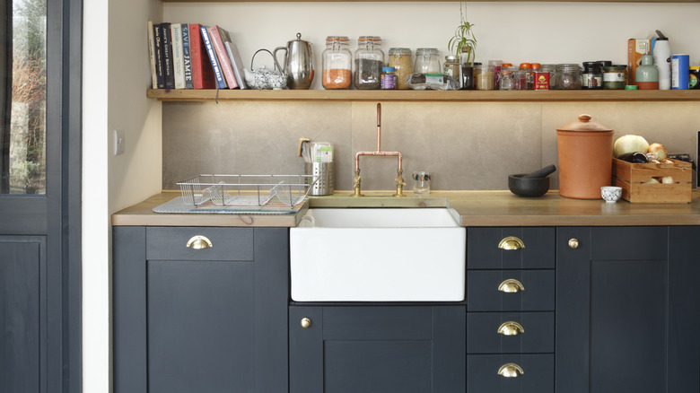 Navy and terracotta kitchen