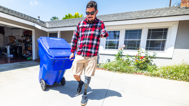 Man taking out trash