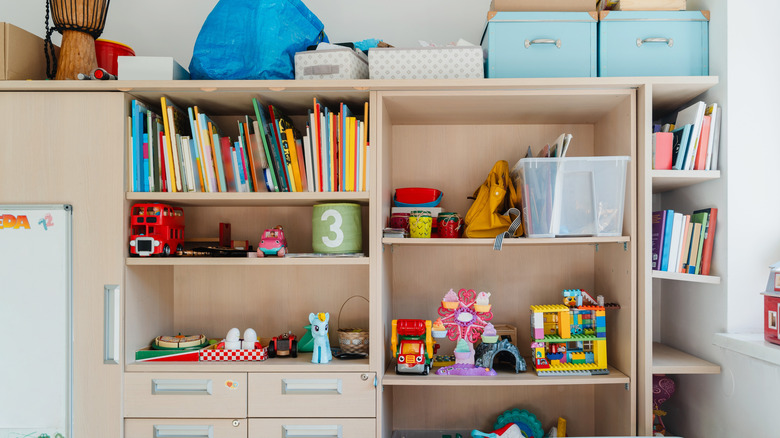 Shelves with toys and kids' books