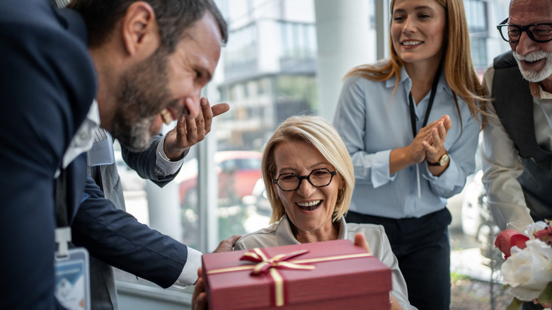 Group of people exchanging gifts