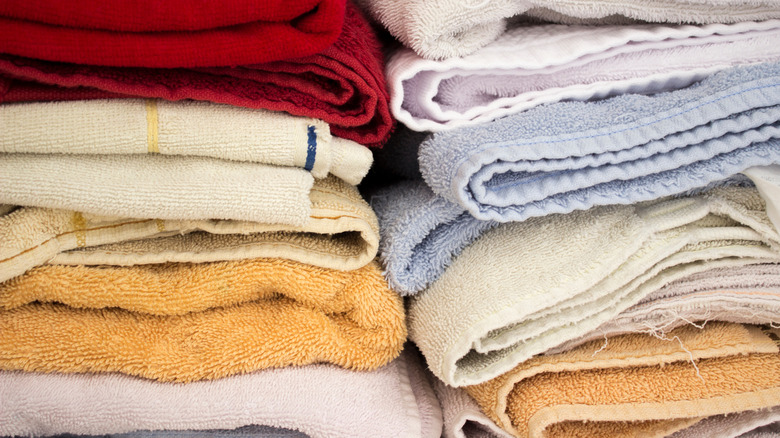 Old towels folded up in stacks