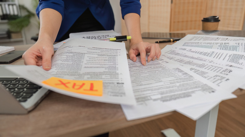 Tax documents spread on desk