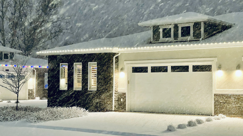Home exterior in snowstorm