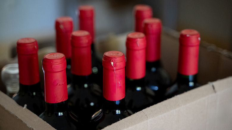 Bottles of wine stored in a cardboard box