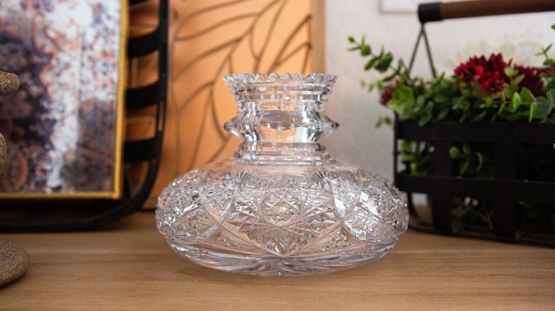 A Libbey vase on a wooden table