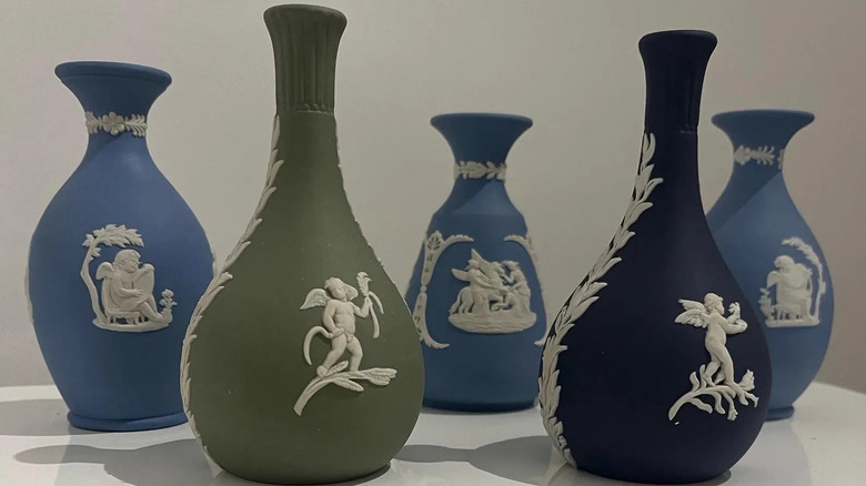 Wedgwood pottery vases in greens and blues