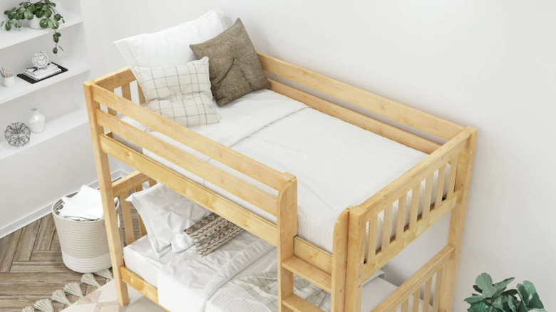 A Matrix Kids twin-sized bunk bed in a bedroom