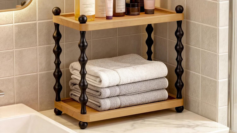 JDNRXO's 2-Tier Vanity Top Organizer on a marble bathroom counter