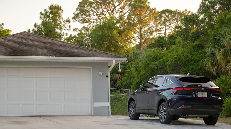 House with a car parked in the driveway