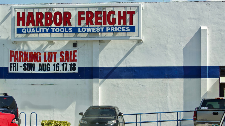 Harbor Freight Tools Parking Lot Sale sign on front of building