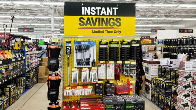 Instant savings sign over tool display at Harbor Freight