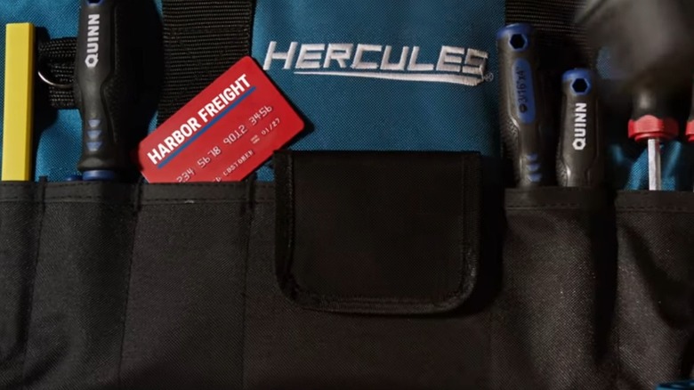 Harbor Freight credit card in tool belt.