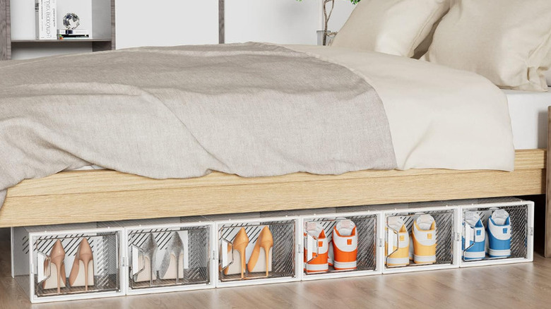 SIMPDIY's XL Shoe Organizer Closet boxes arranged beneath a bed