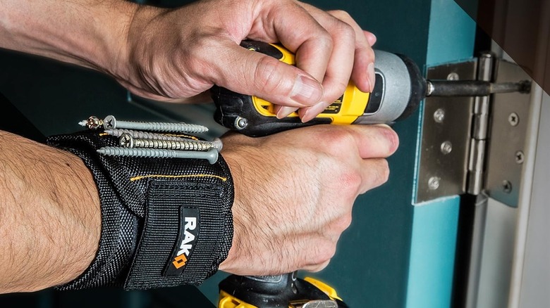 A person wearing RAK's Magnetic Tool Wristband