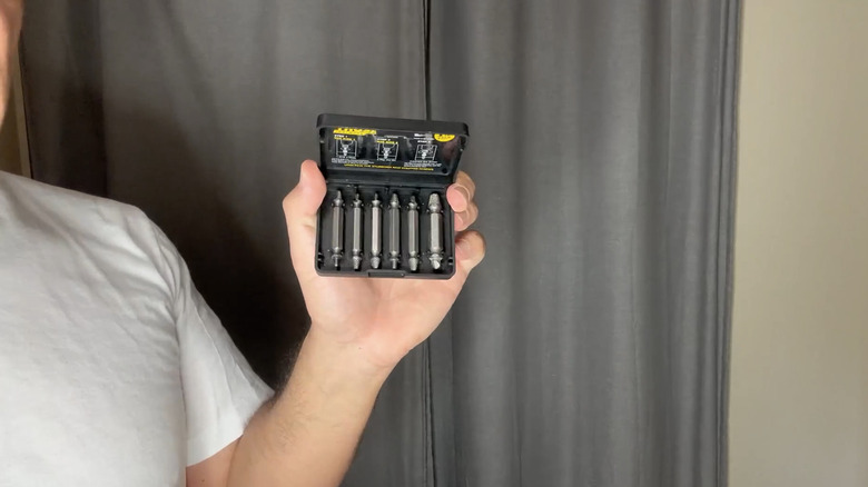 A person holding Thosaf's Damaged Screw Extractor Set