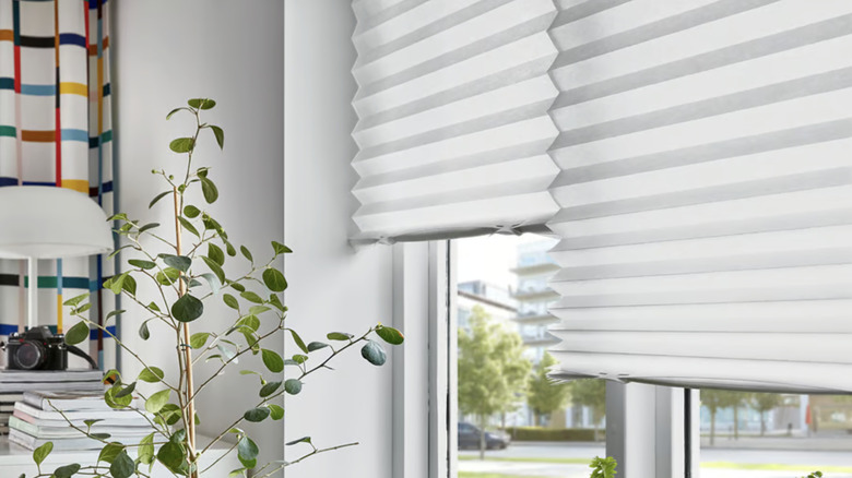 Two SCHOTTIS pleated shades from IKEA over a window