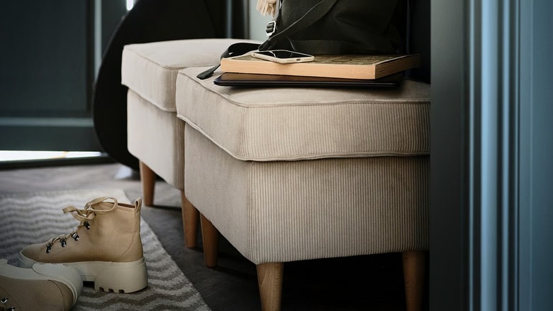 two STRANDMON ottoman in entryway