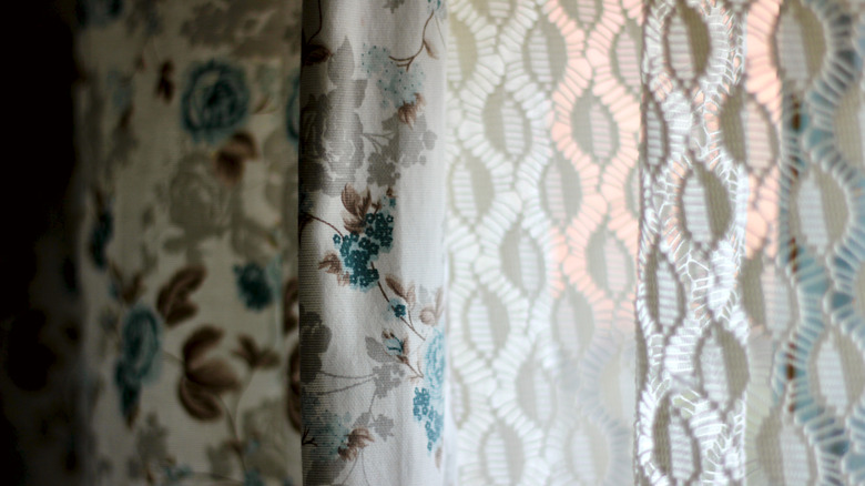 Textired lace panel and floral fabric curtains