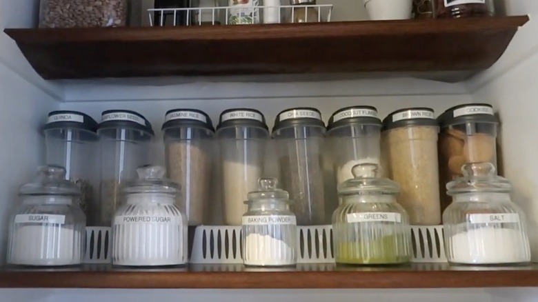 Plastic basket risers in back of pantry cabinet