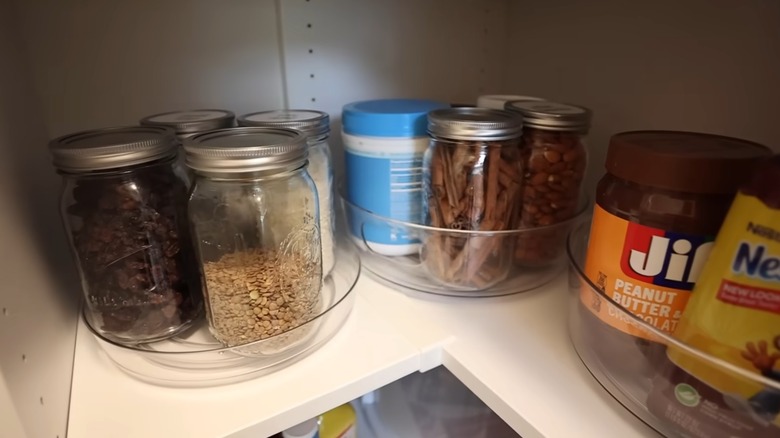 Turntables on corner shelf of pantry