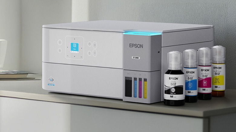 Espon ET-2968 printer on a desk with four EcoFit bottles of ink