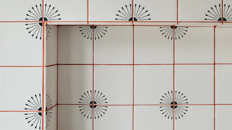 White wall tiles with decor tattoos applied