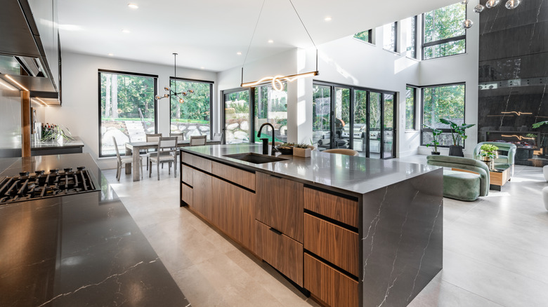 A large kitchen island in a contemporary kitchen