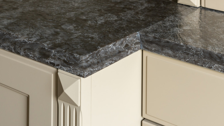 Gray ogee edge countertops.