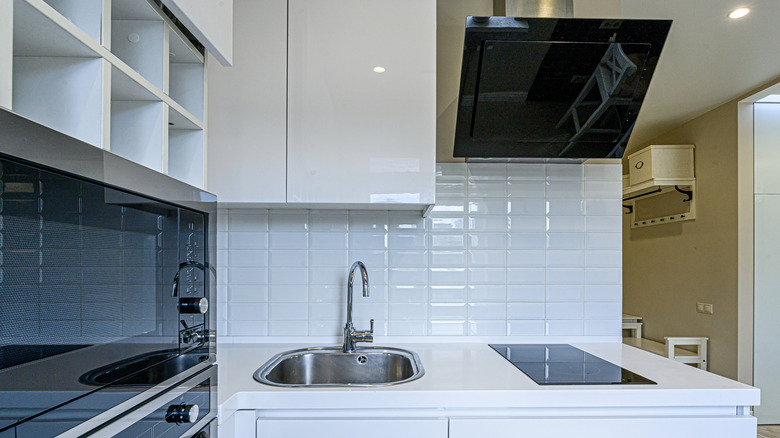 Modern kitchen with white subway tile backsplash