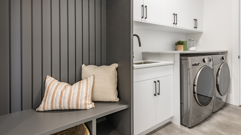 Refinished washer and dryer in small corner of garage