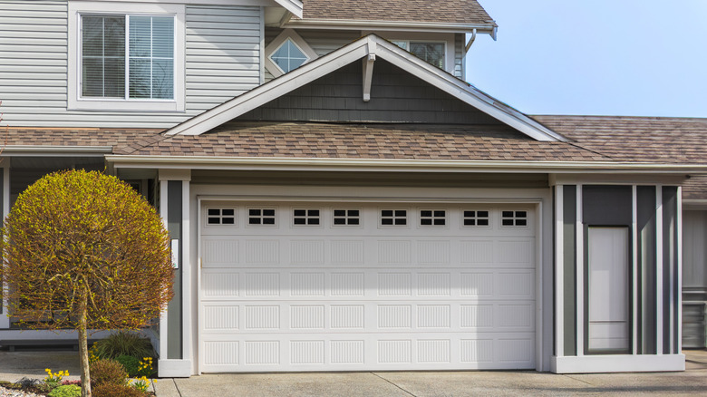 Exterior of attached garage with house