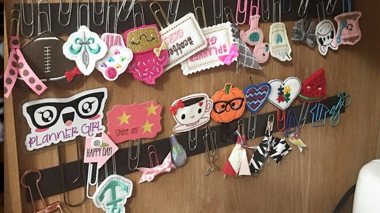 paperclips mounted on magnet board