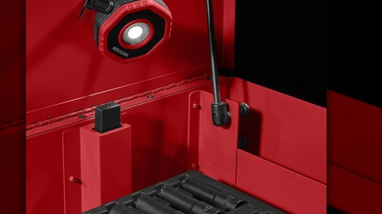 magnetic light secured to workspace and shining on tools