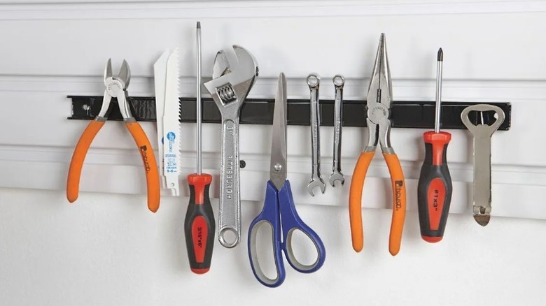 magnetic strip with scissors and tools