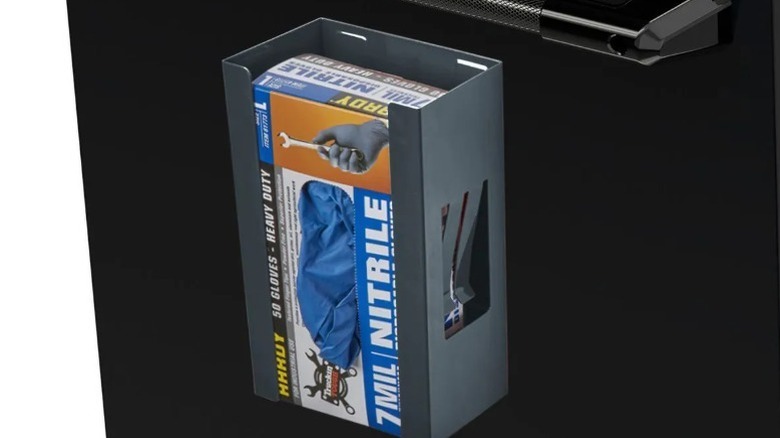 magnetic holder on side of work table with box of nitrile gloves