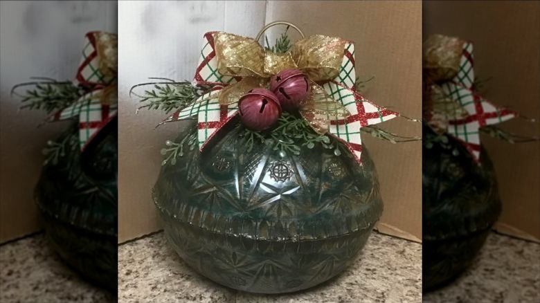 DIY project using plastic punch bowls to create an oversized Christmas tree ornament